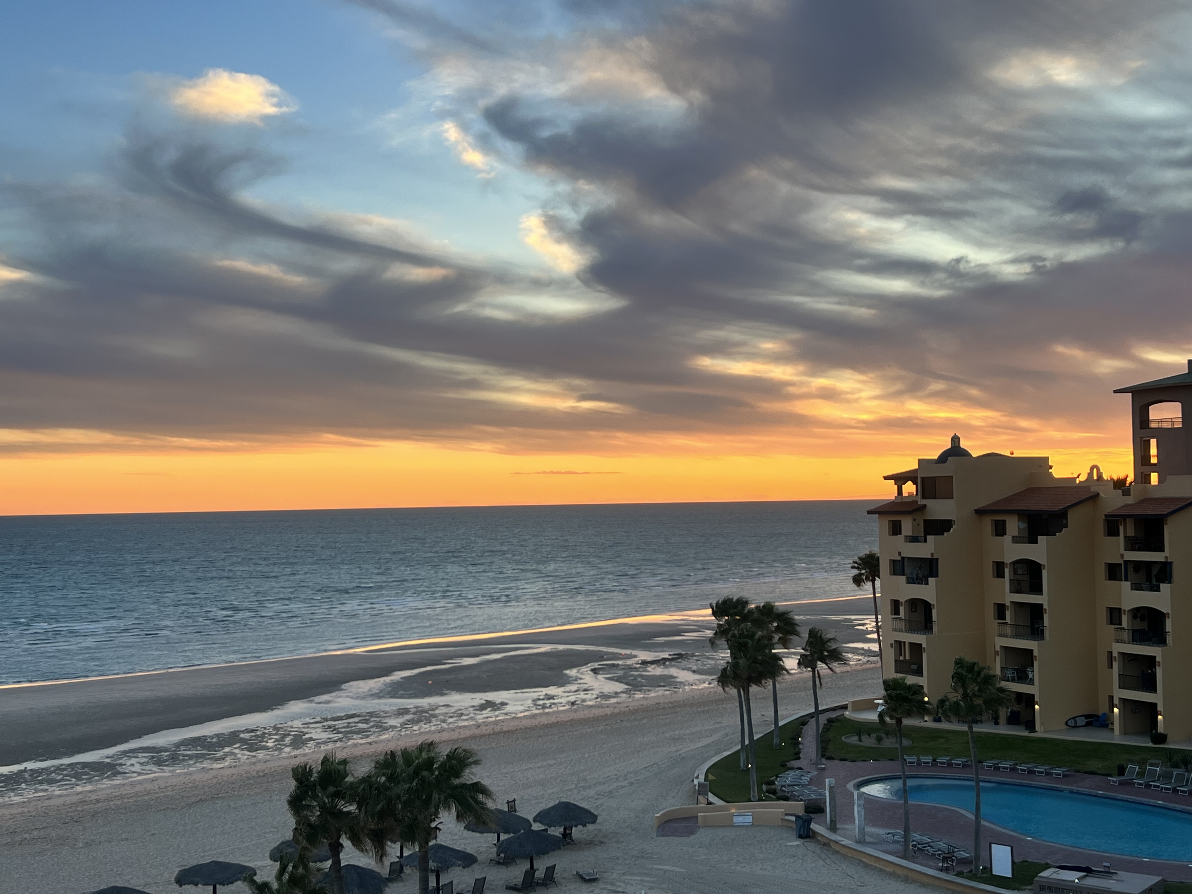 Beach ocean sunset with clouds